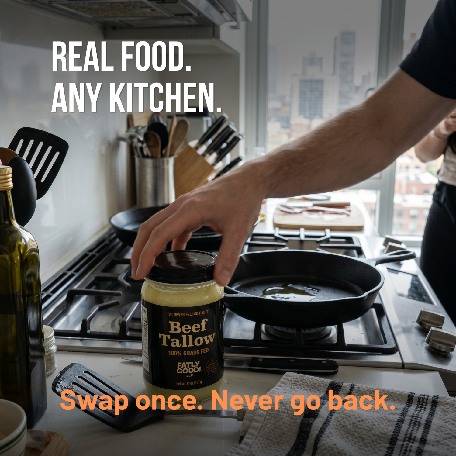 Person holding a jar of beef tallow in a kitchen with text 'Real Food. Any Kitchen.'