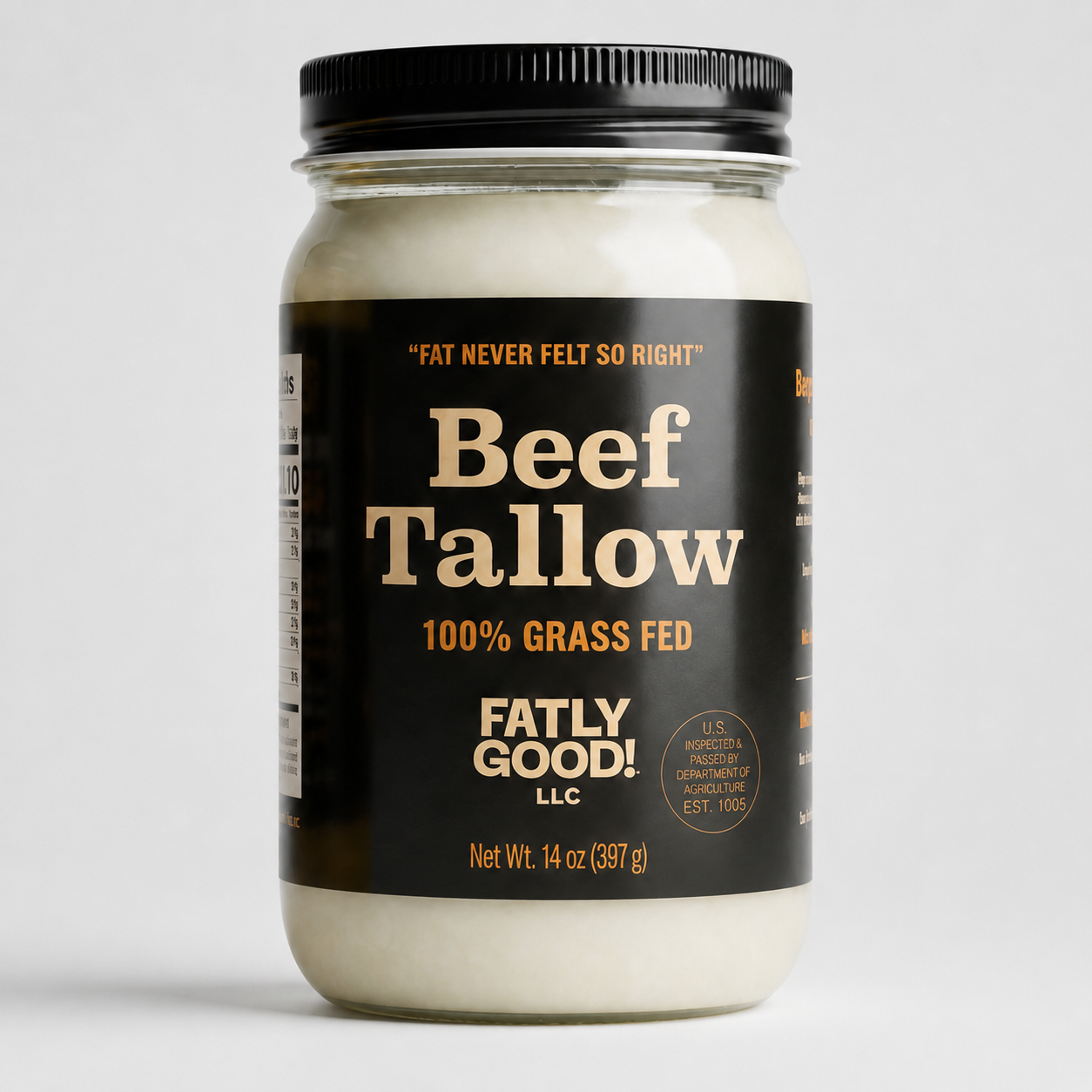 Jar of Fatly Good 100% Grass-Fed Beef Tallow 14oz on a dark moody background